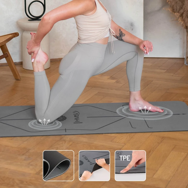 Joogakomplekt HMS – joogamatt TPE, plokk ja rihm6 a woman doing yoga on a mat