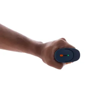 K-Grip ülaosa pealtvaates: oranž toitenupp, LED-märgutuli ja paela kinnituskoht