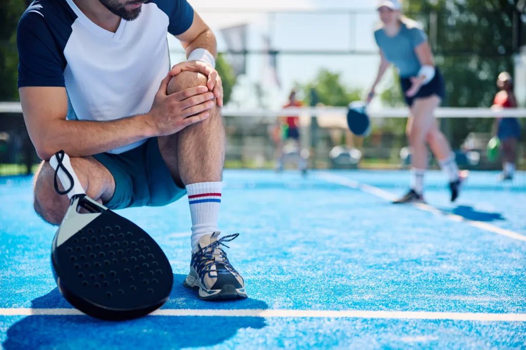 close up of athlete feeling pain in his knee while 2026 03 17 07 05 54 utc